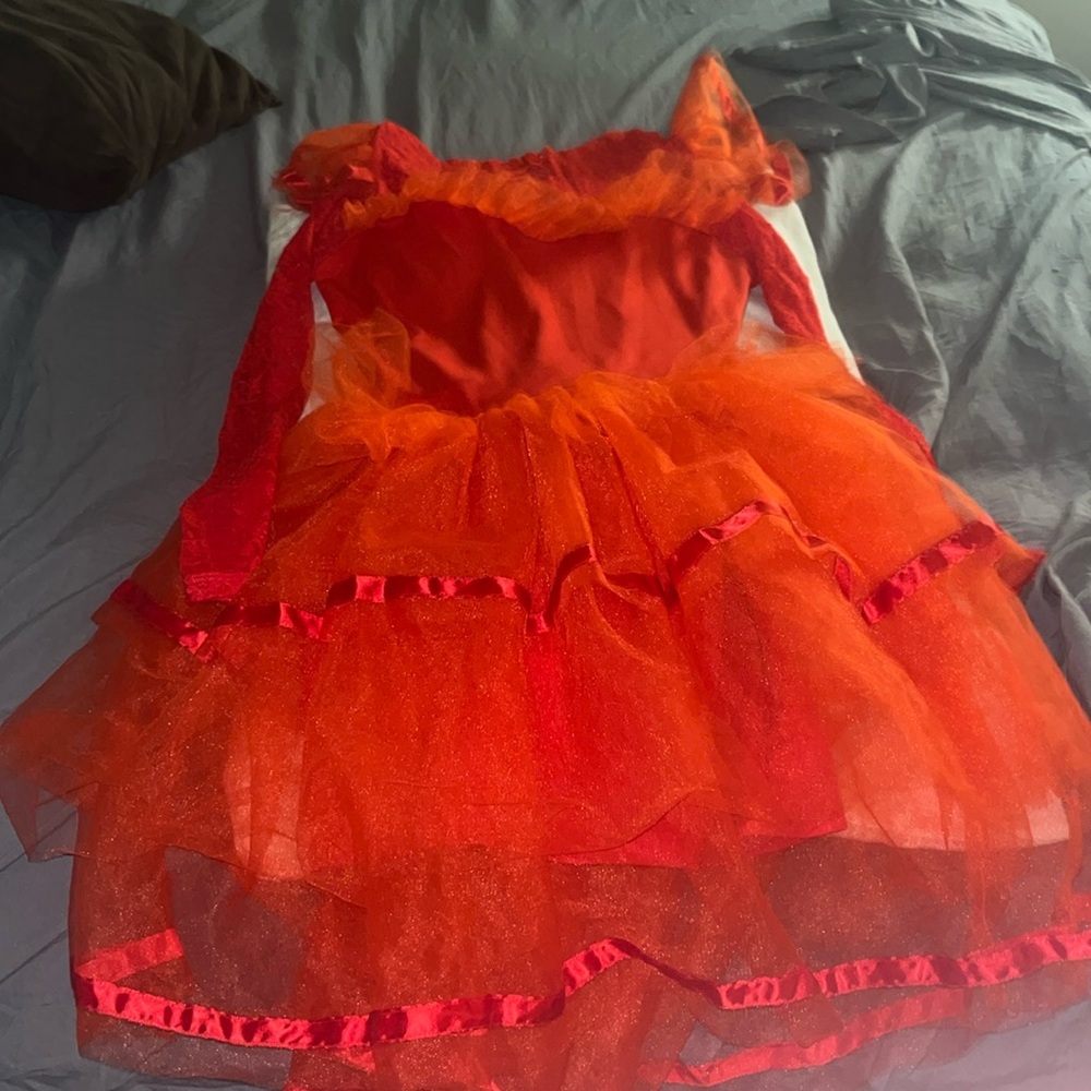 Lydia deetz small costume .  Bought for a performance too tight never worn